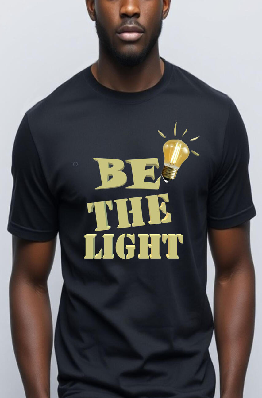 Be The Light Men's Christian T-shirt. Featuring a gold light bulb, with the words in gold, "Be The Light."
